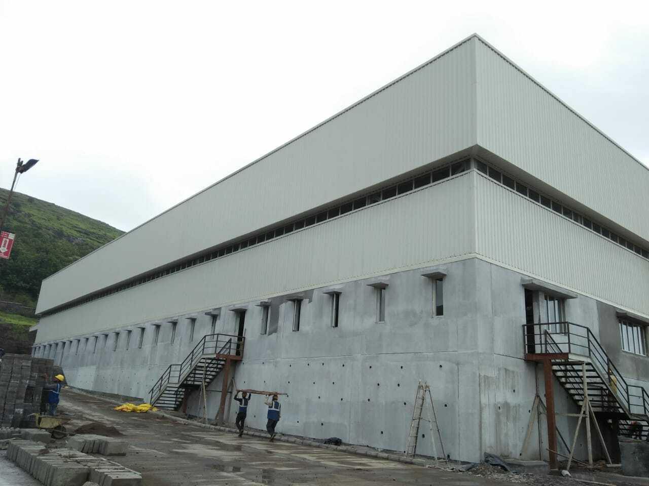 Double skin insulated aluminum roofing system with glass wool insulation by Rishonn & Reyansh at Ognibene Power, Talegaon.