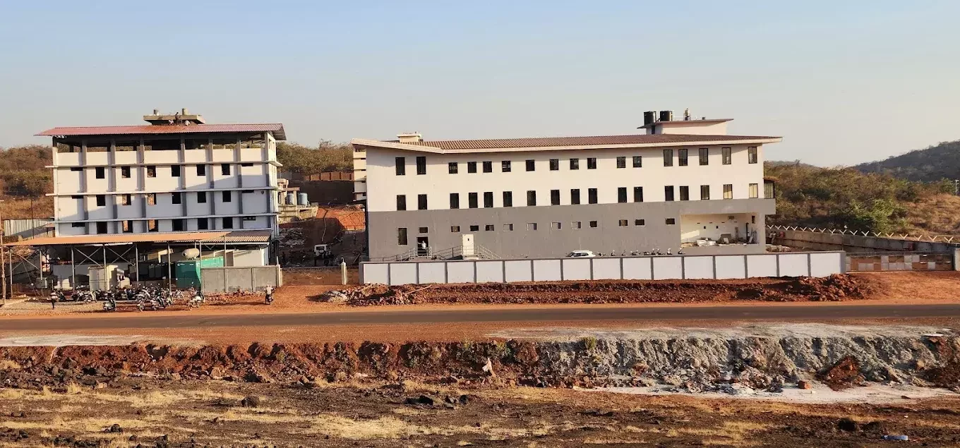 Zero-penetration Klip-Lok 770 single skin roofing system for seafood processing facilities in Chiplun, Konkan.