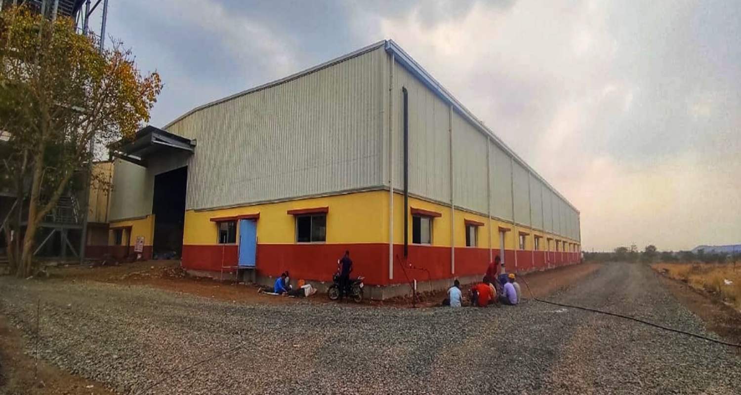 Trapezoidal roofing sheets and PC skylight installation at Japfa Comfeed India by Rishonn & Reyansh.