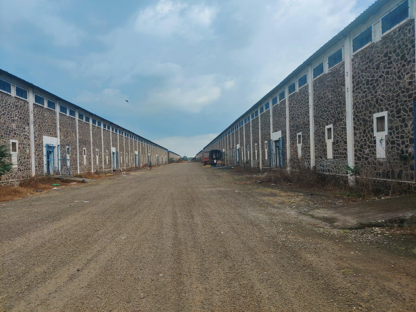 Engineered re-roofing for MSWC Grain Storage Godown Miraj using TATA BlueScope Klip-Lok by Rishonn & Reyansh